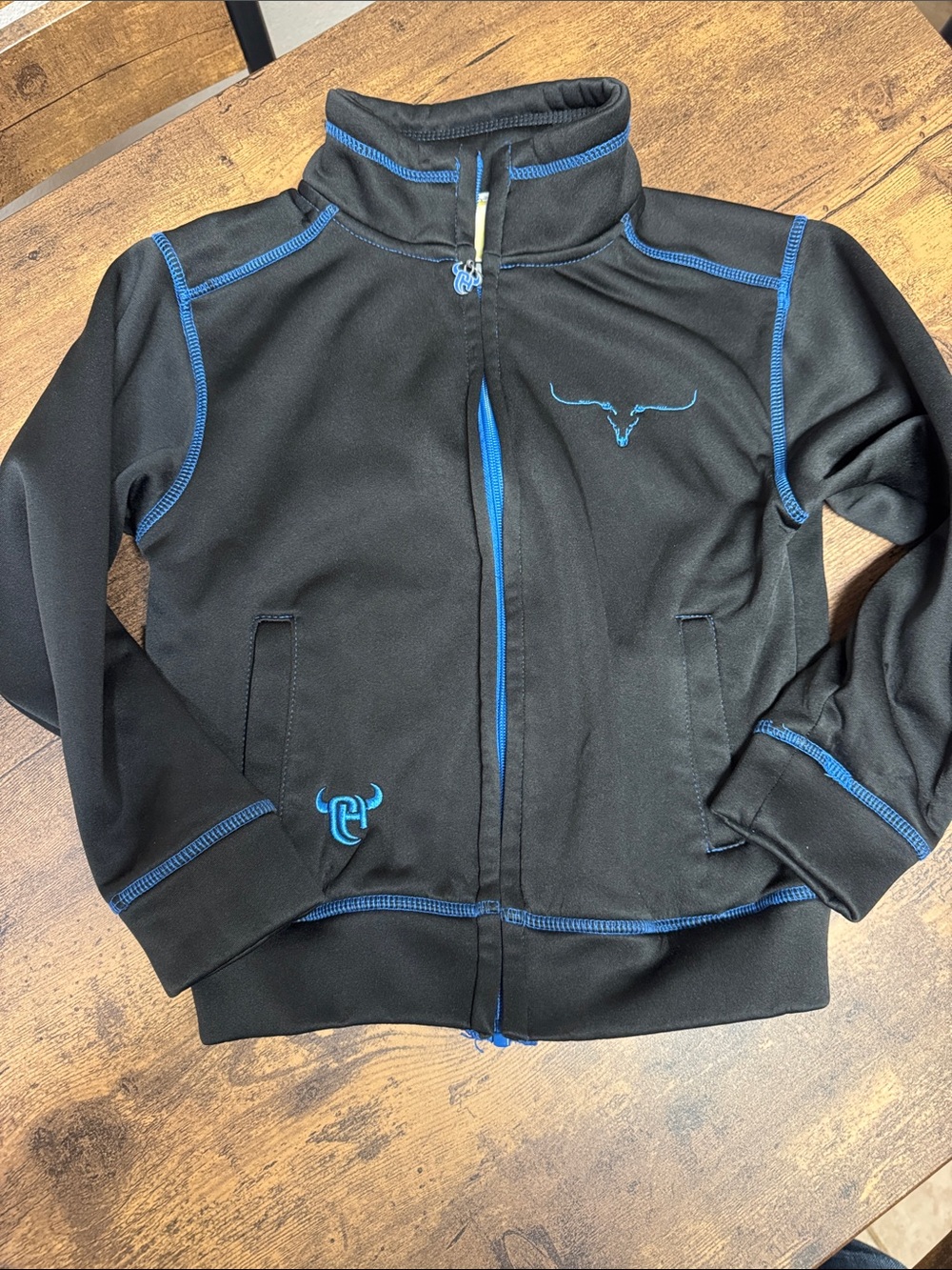 Kids Black Zip Jacket with Blue Trim - Steer Logo